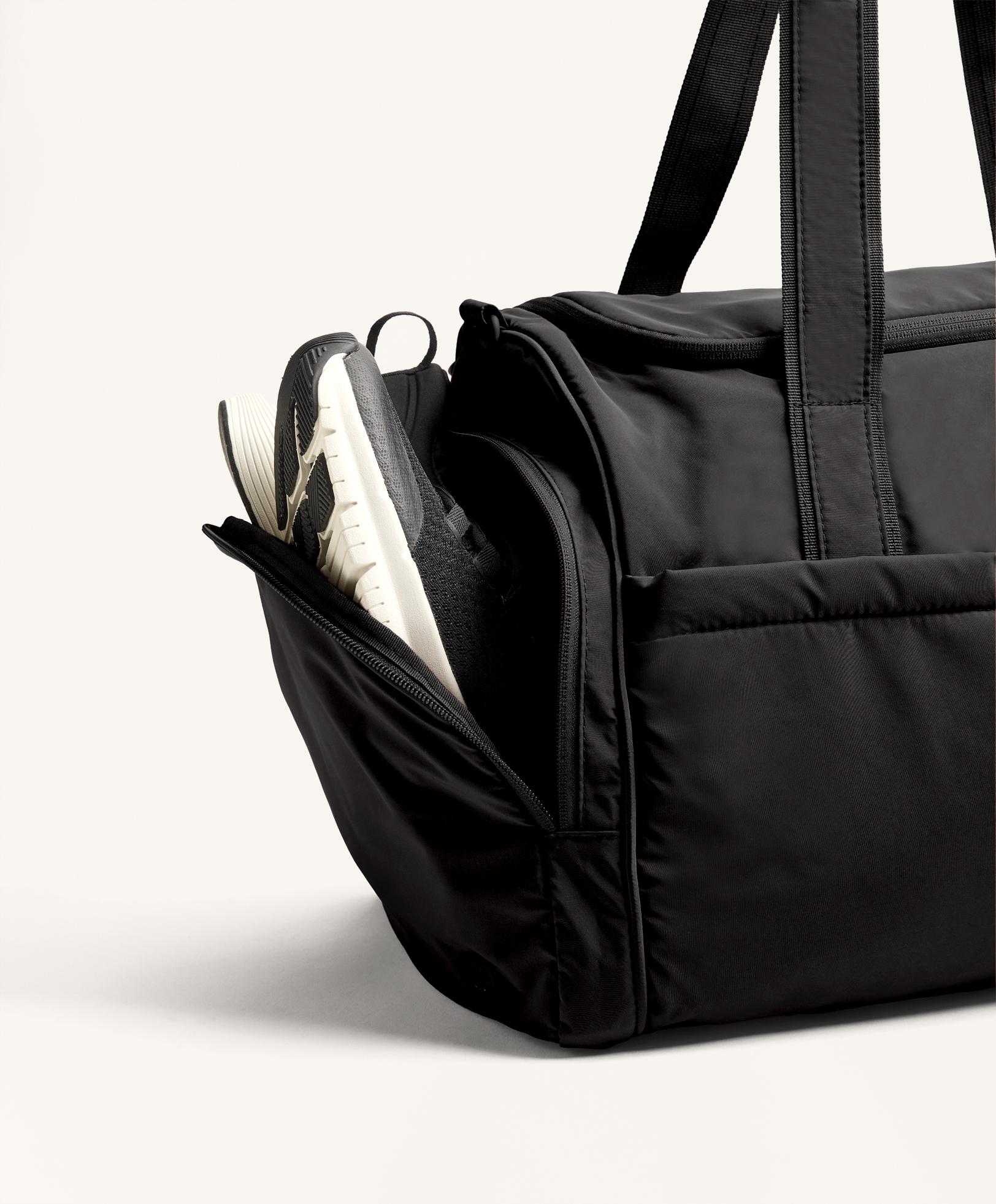TECHNICAL BAG WITH SIDE POCKETS