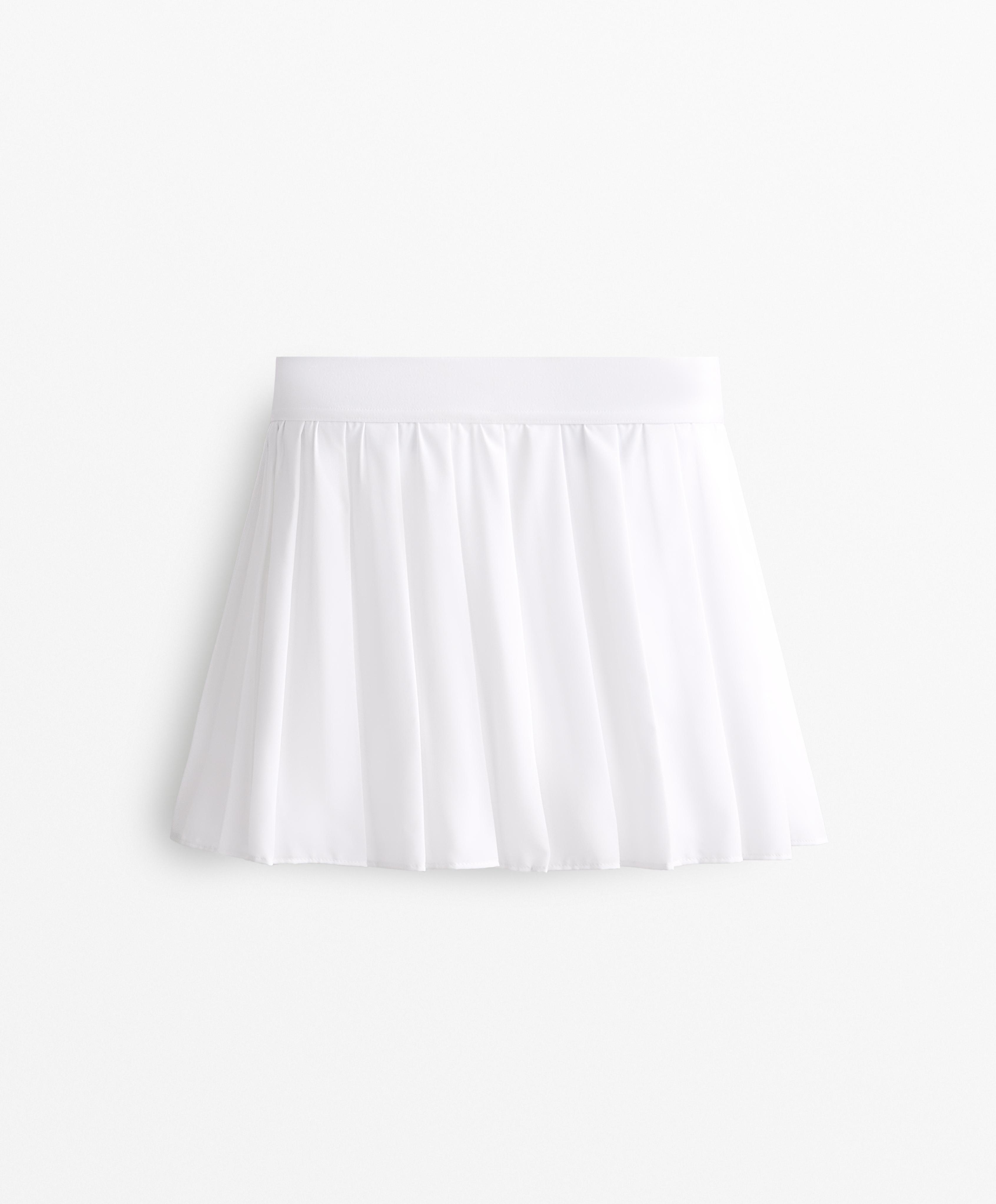 PLEATED COMPRESSIVE SKIRT