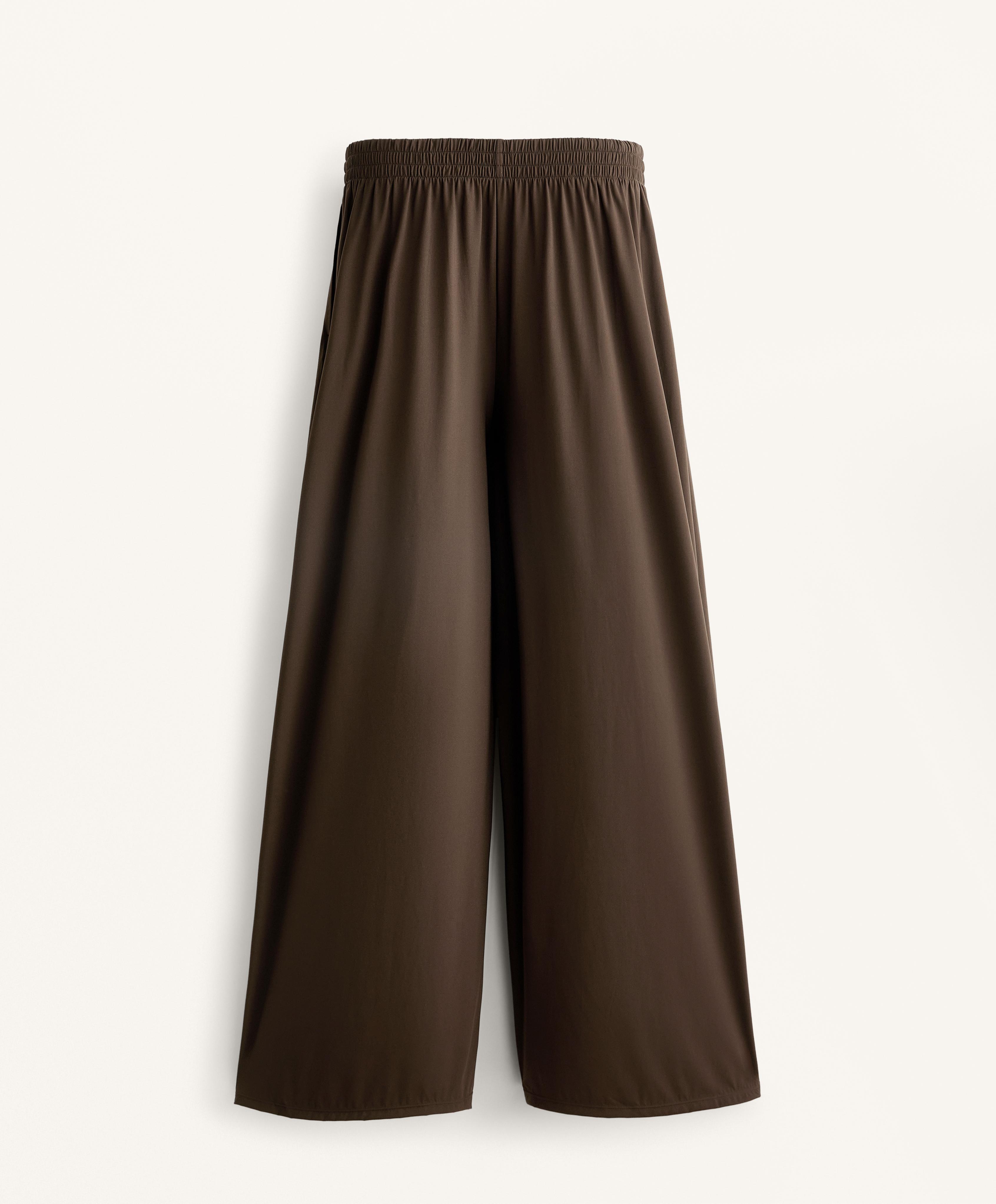 LIGHT TOUCH WIDE LEG PLEATED TROUSERS