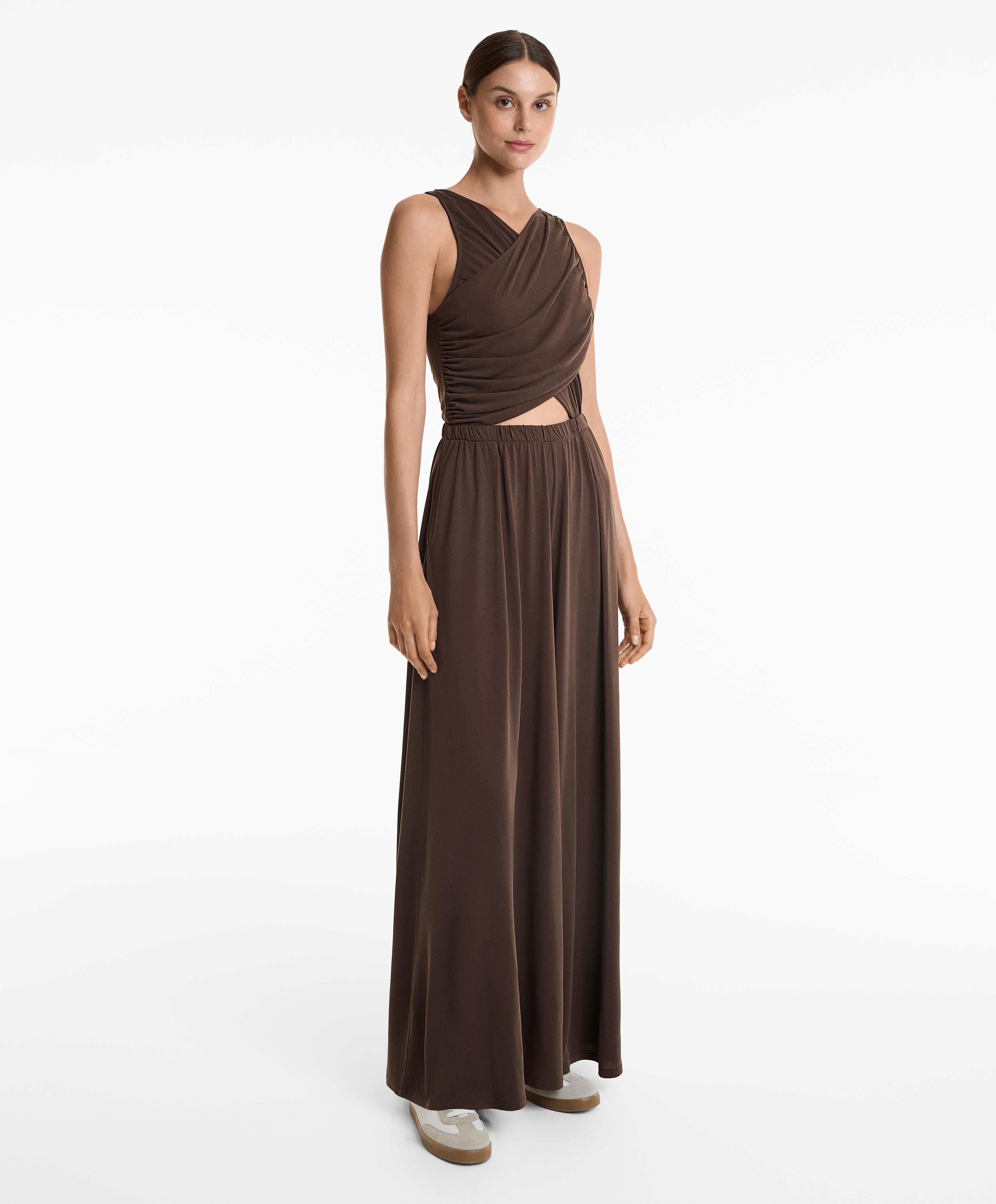 FLOATY CROSSOVER JUMPSUIT WITH MODAL