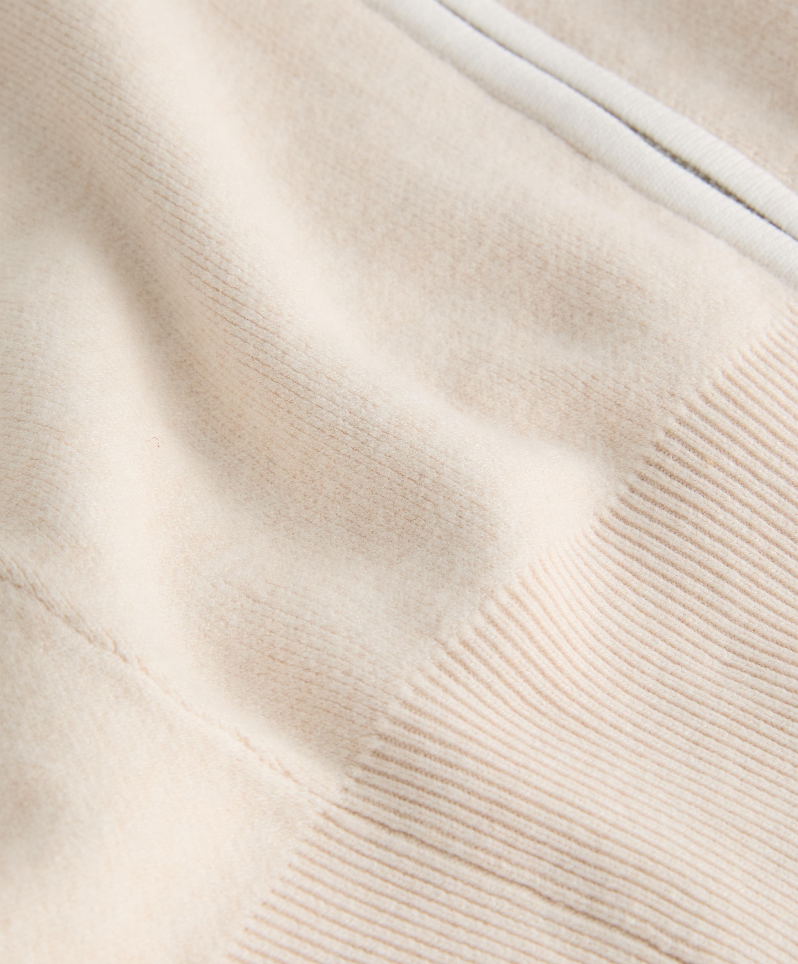 HIGH COLLAR KNIT JACKET WITH CONTRAST PIPING