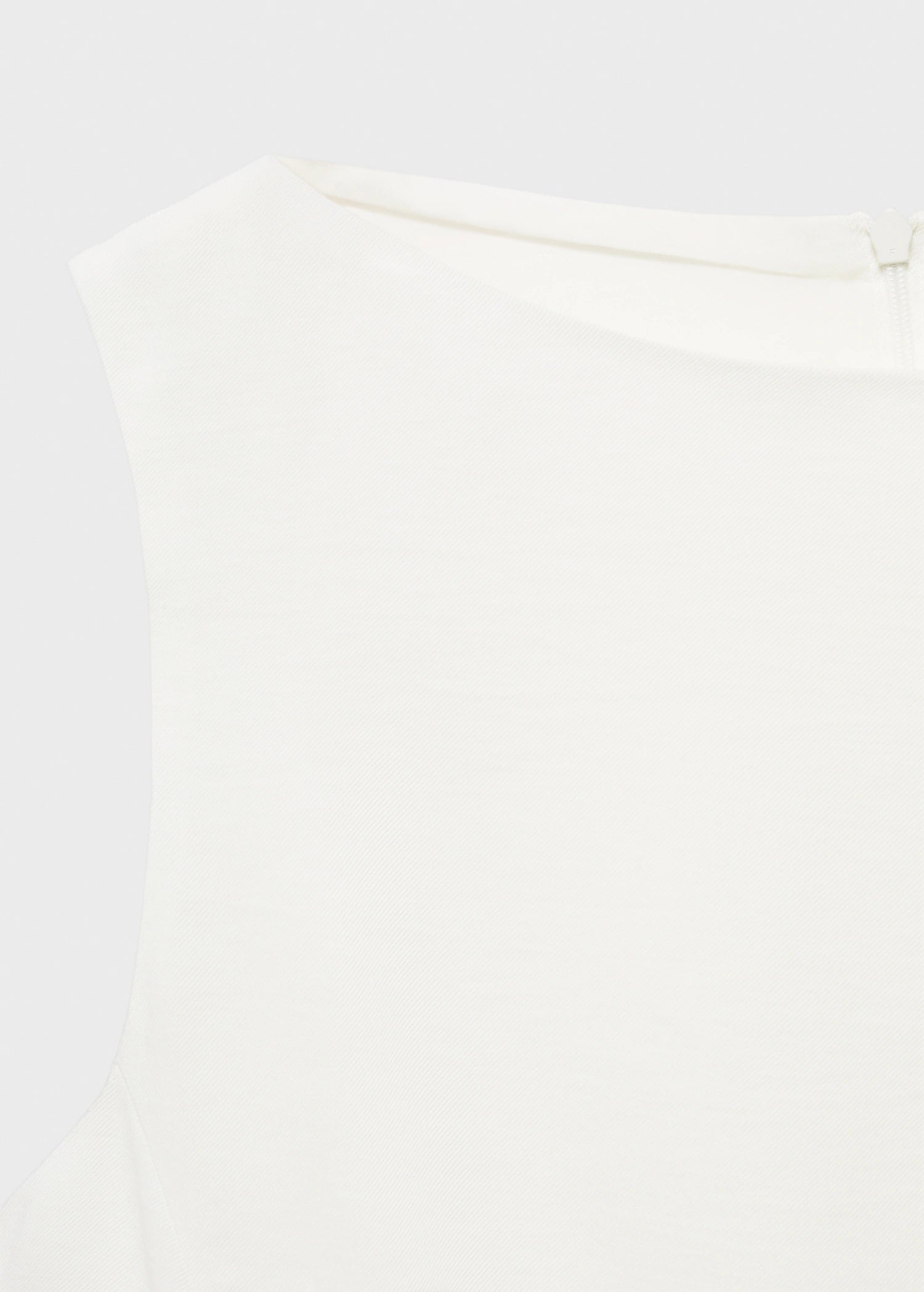 Peplum Top With Pleat Detail