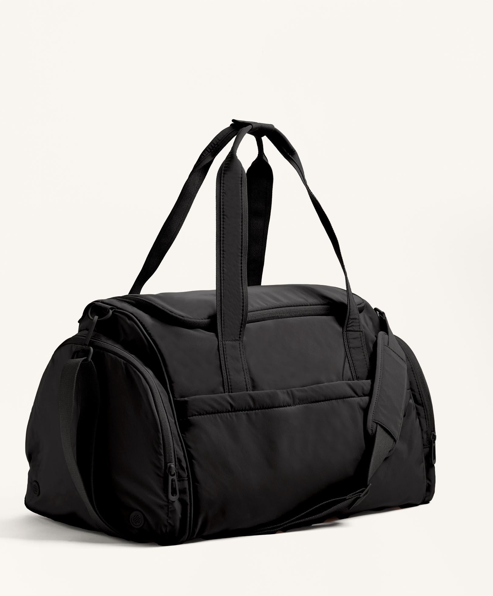 TECHNICAL BAG WITH SIDE POCKETS