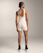 COMPRESSIVE CUTWORK SHORT JUMPSUIT