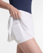 PLEATED COMPRESSIVE SKIRT