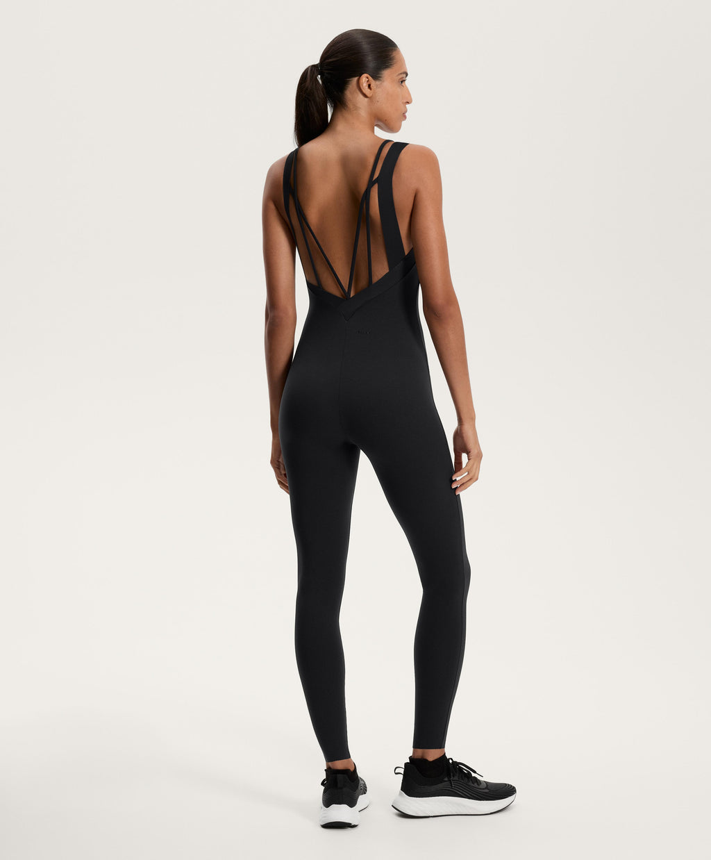 COMPRESSIVE LONG JUMPSUIT WITH BACK STRAPS