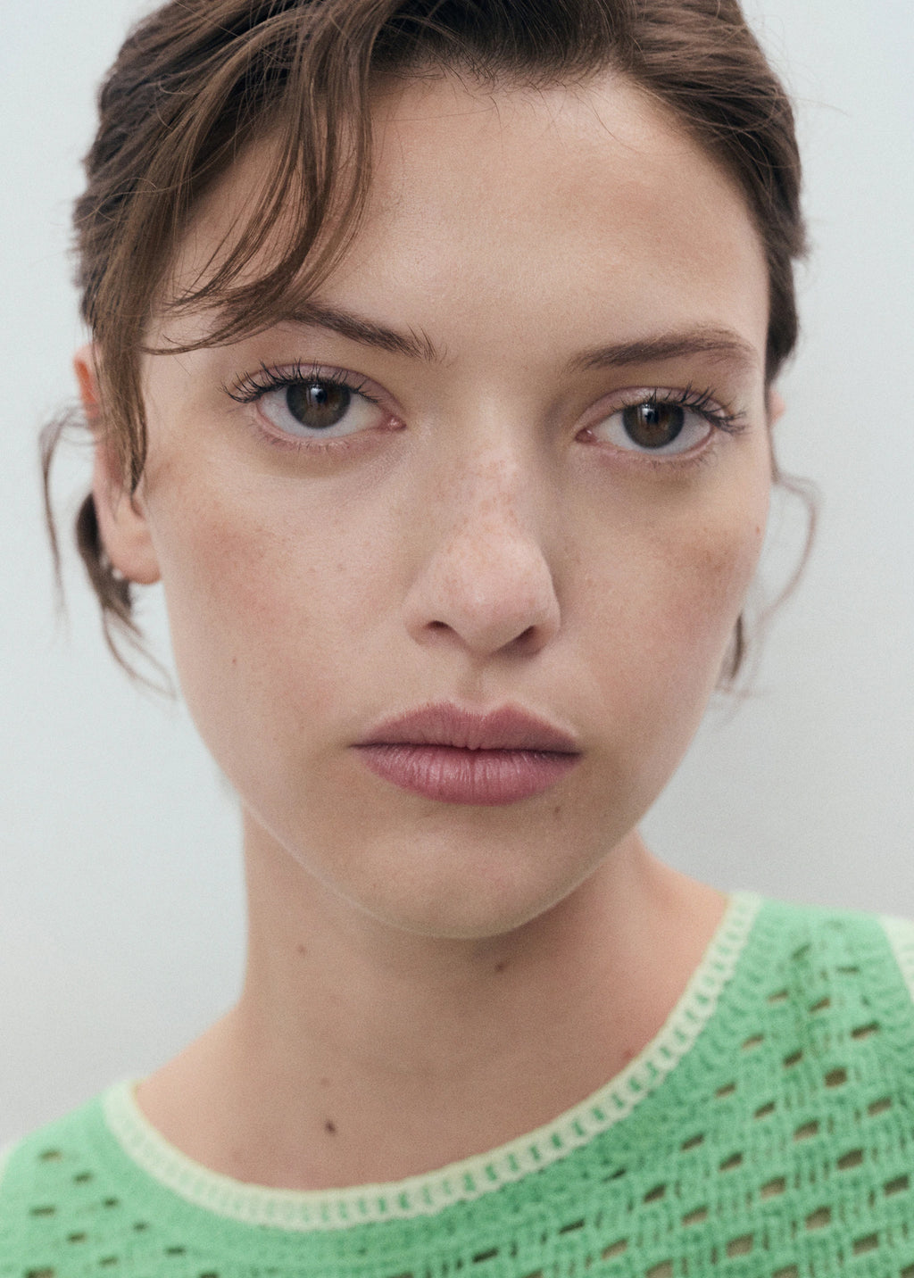 Crochet Top With Floral Finishes