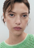 Crochet Top With Floral Finishes