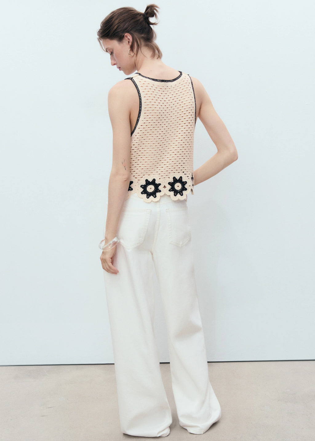 Crochet Top With Floral Finishes