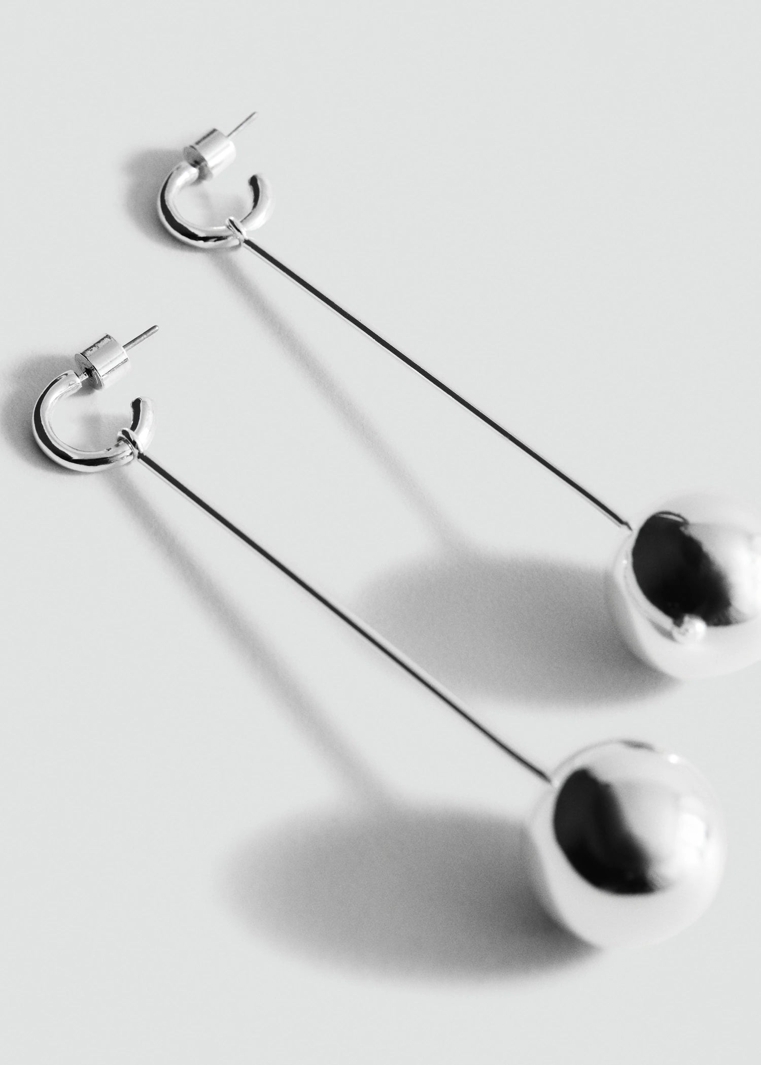 Long Sphere Hanging Earrings