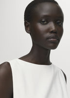 Peplum Top With Pleat Detail