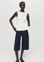 Peplum Top With Pleat Detail